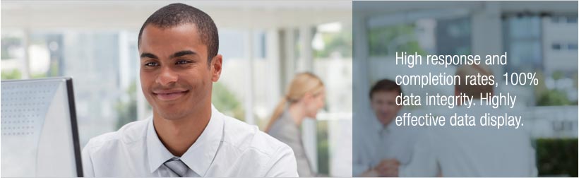 Young businessman looking at the computer. Caption: High response and completion rates, 100% data integrity. Highly effective data display.